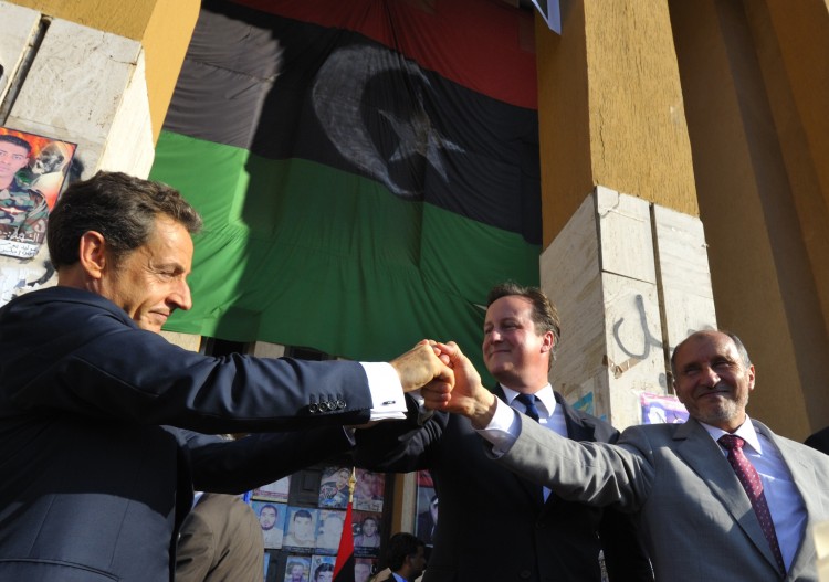 Nicolas Sarkozy with UK Prime Minister David Cameron and former NTC leader Mustafa Abdul Jalil in Benghazi in November 2011