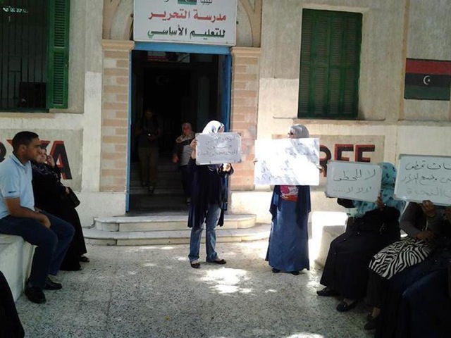 Teachers protest outside the Mermaid Girl's School in 24 December Street