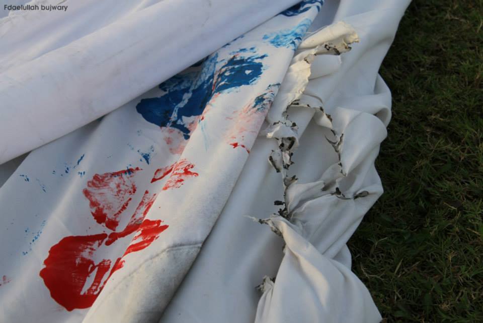 The remains of the flag, showing fire damage (Photo: Fdaelullah Bujwary)