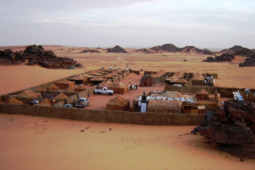 Figure 6: Another tourist camp within the Tadrart Akakus area (on the eastern edge). This landscape, although less spectacular than that of the previous camp area, is still very attractive with sand dunes and sandstone hills surrounding the camp (Photo: Courtesy of ESSL). 
