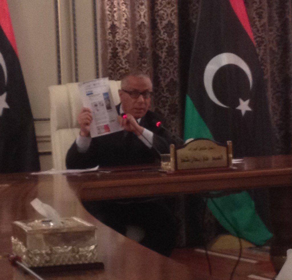 The Prime Minister shows copies of forged press reports that claimed he had given names of Libyan Islamists to the Americans 