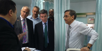 UK Minister Hugh Robertson at Tripoli Medical Centre to meet victims of the Gharghour atrocity
