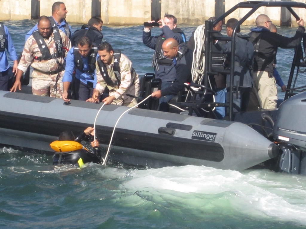 Members of the Libyan Coastguard practise a ‘man overboard’ rescue (Photo: Tom Westcott, Libya Herald)