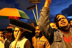 The broom has been adopted as the symbol for sweeping away the GNC by . . .[restrict]opponents of its extension (Photo: Aimen Amjad, Benghazi).