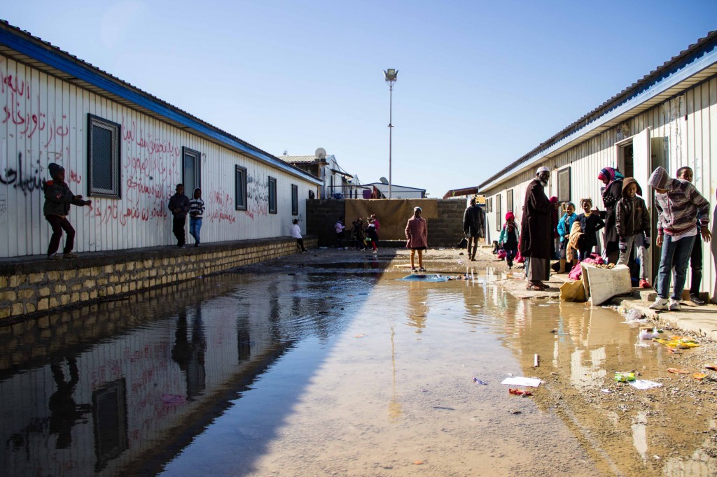 Children play in the street outside the school in the Fellah Road camp (Photo: Ibrahim El Mayet)