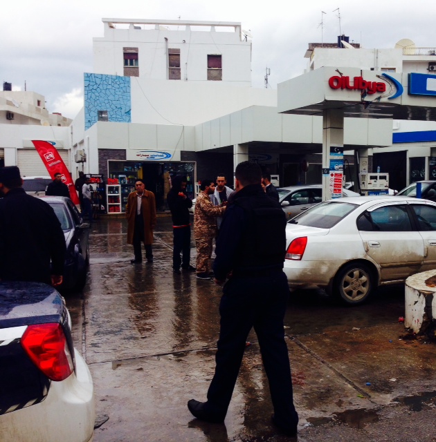 Security forces at one Tripoli petrol station (photo; Aimen Eljali)