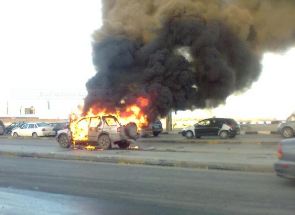 car was set ablaze after a grenade was thrown into it