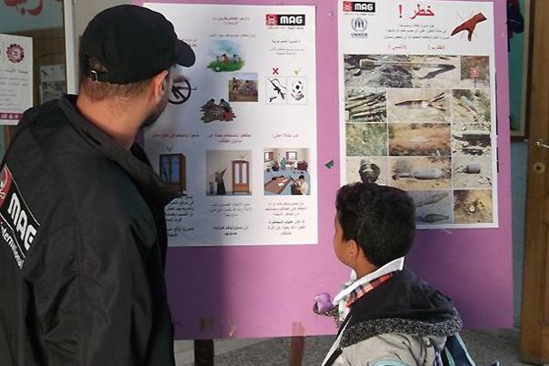 Children are shown the different types of unexploded ordinance commonly found in . . .[restrict]Libya (Photo: MAG)
