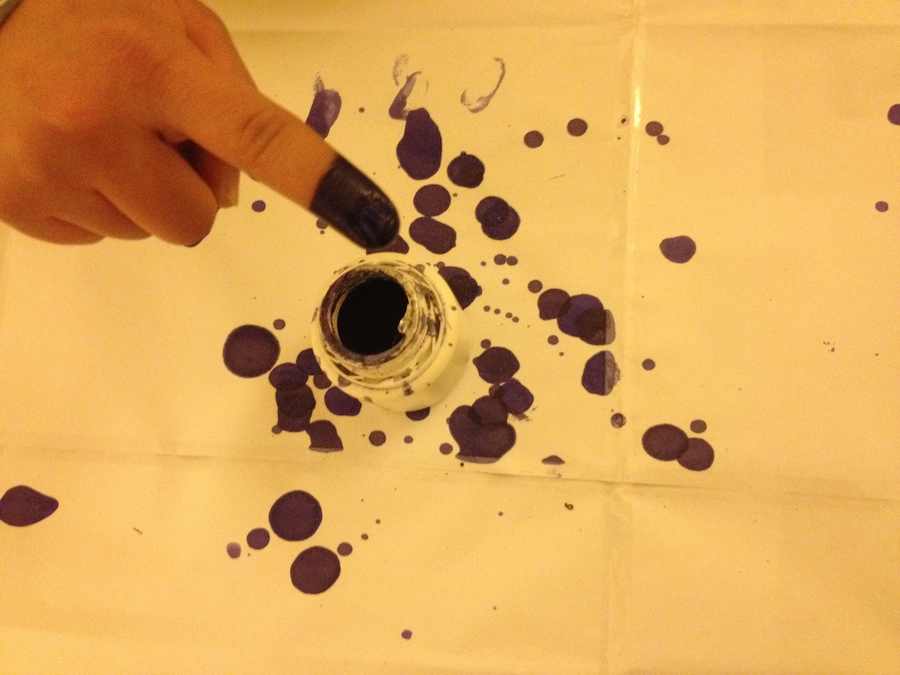 Voters dip their fingers in ink that lasts (Photo: Tom Westcott) 
