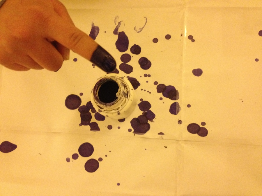 Voters dip their fingers in ink that lasts (Photo: Tom Westcott)