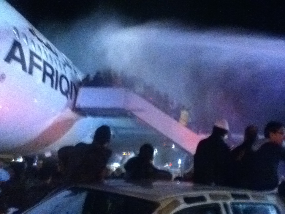 The Fire Brigade sprayed the crowds with water to try and get them to move away from the plane (Photo: Richard Galustian)