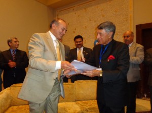 Head of the Libyan Businessmen Council, Abdelnaser Almana signs the agreement with the Confederation of Indian Industry Co-chairman Deepak Premnerayan yesterday (Photo: Sami Zaptia).