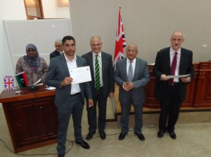 British ambassador Michael Aron, together with Tripoli University Chancellor Madani Dakheel and Deputy Commander Stuart Roberts handing out certificates at the ceremony held at the University of Tripoli Language Centre yesterday (Photo: Sami Zaptia).