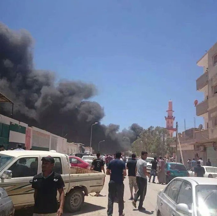 Smoke billows above Benghazi's Egyptian Market (Photo: 