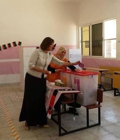 Salwa Bughaigis voting in today's elections (Photo: her Facebook page) 