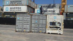 The containers and their refrigeration unit unloaded onto the dock (Photo Police and Customs)