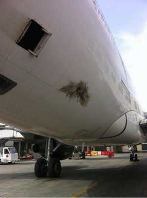 A picture believed to show the "written off" A330, whose tail section was also riddled.(Picture: social media)