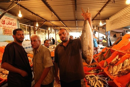 Vendors at Benghazi fish Market (Photo: Adam Kwafi)