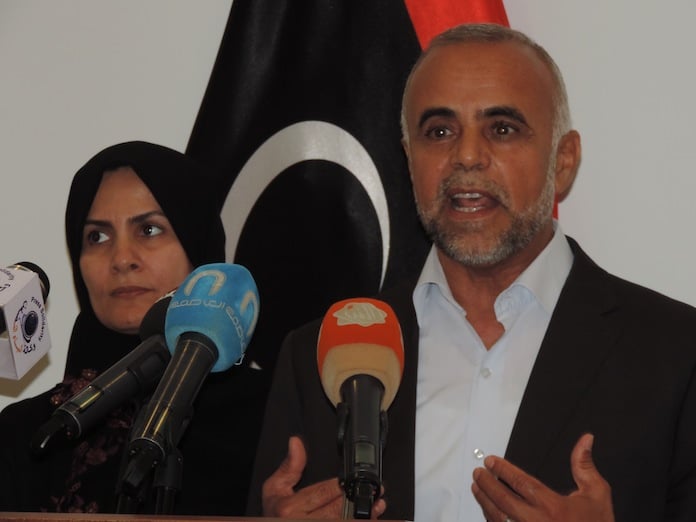 Harizi accompanied by his wife  speaking today of his ordeal (Photo: Seraj Essul)
