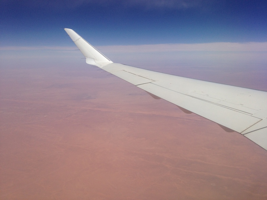 A Libyan Airlines plane flies over the desert but there communication systems are limited in the south of the country (Photo: Tom Westcott) 