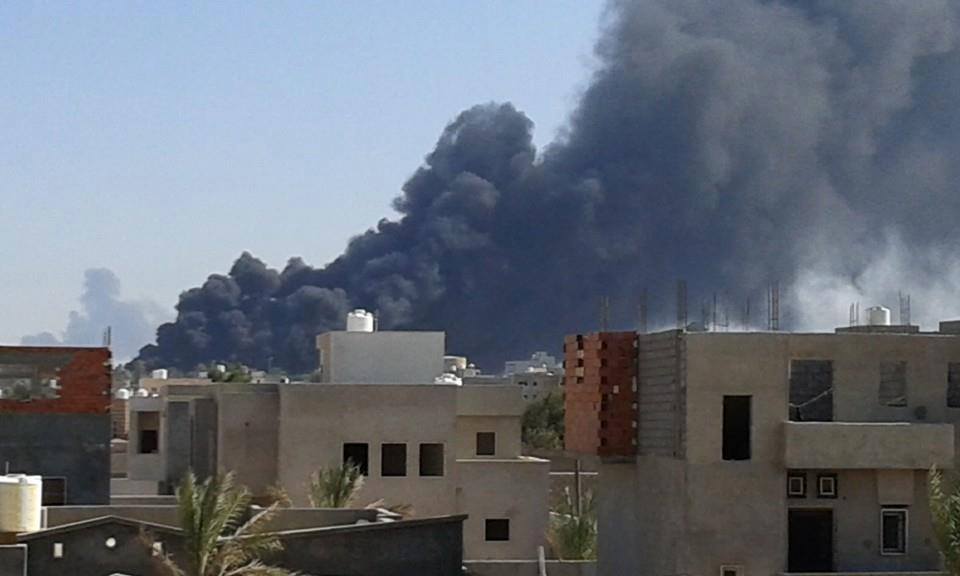 Smoke rising over Tripoli