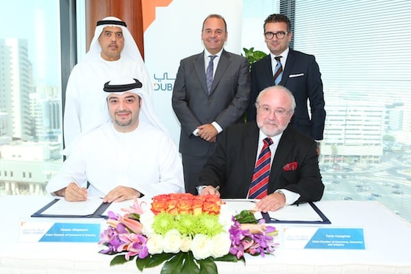Tonio Casapinta (right) and Hasan Al Hashemi signing the agreement with (from left) Abdul Rahman Sajf Al Ghuarain (Chairman of Dubai Chamber of Commerce), Christian Cardona (Maltese Minister of ) and Anthony Tabone 