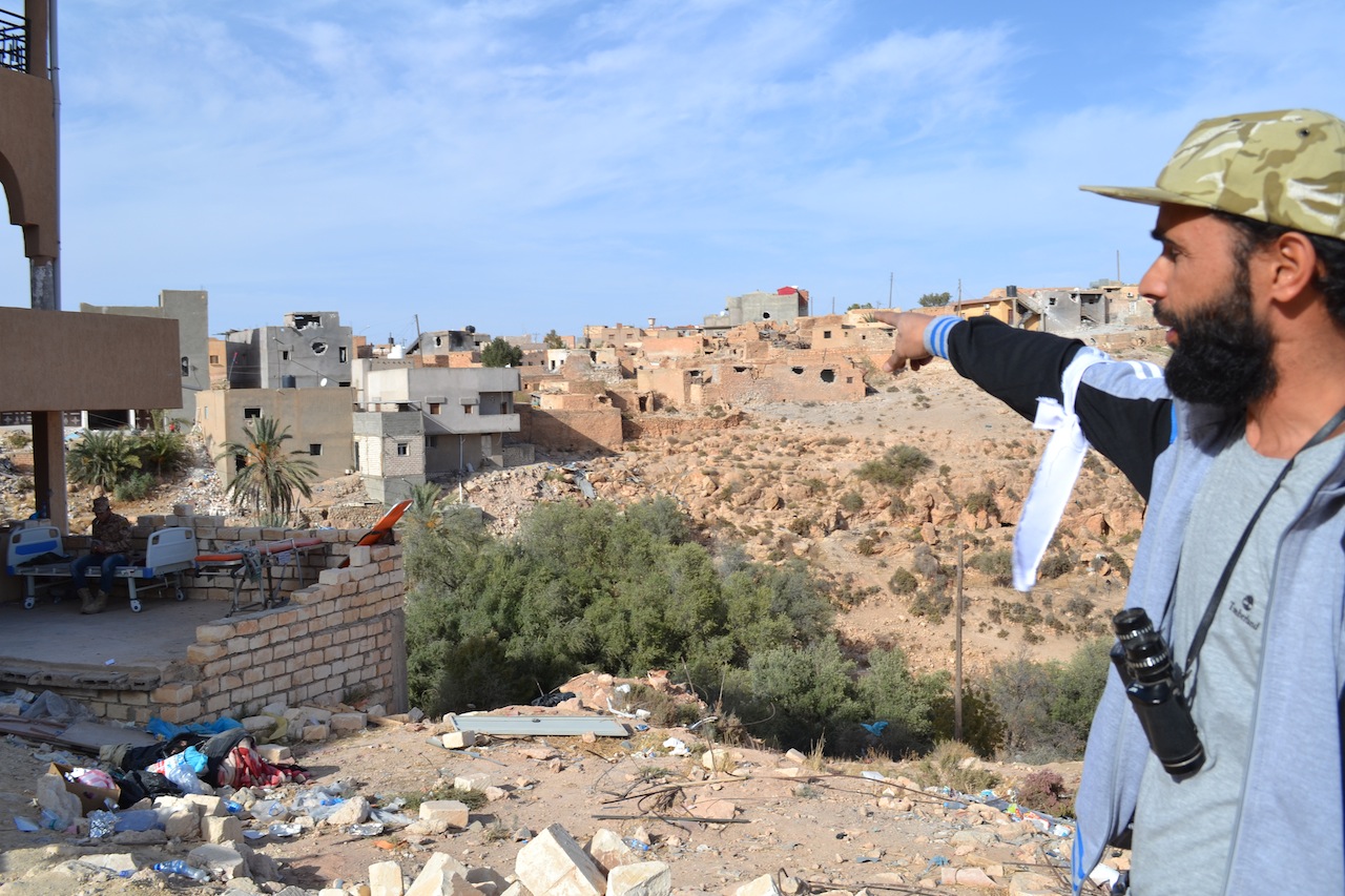  Pointing to Zintani snipers (Photo: Libya Herald reporter)