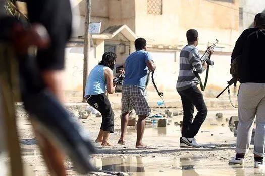 Gunmen clash in Benghazi (Photo: Abdullah Doma)