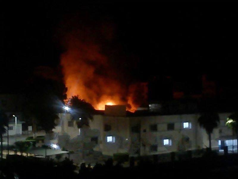 Fires rage into the night at Benghazi's Jumhoriya Hospital (Photo: Social Media)