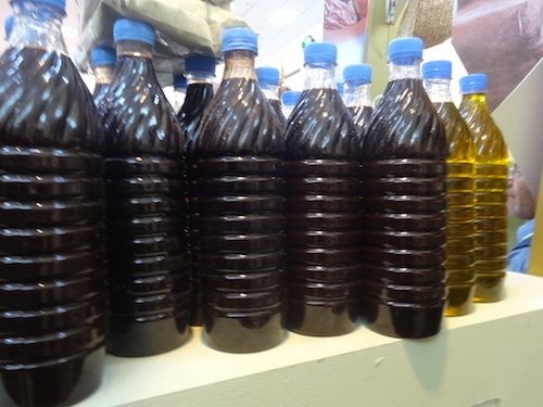 Bottles of rube - date syrup - made in Khoms