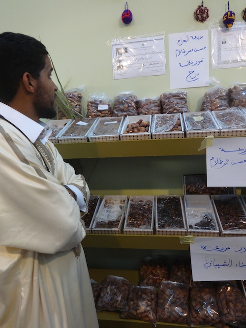 A seller contemplates dates from Derj, near Ghadames