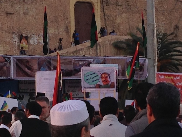 some protestors carried defaced images of CDA head Ali Tarhouni (photo: )