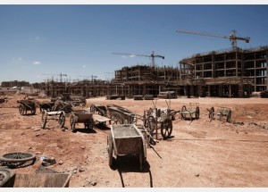 Projects abandoned at the Revolution are marked by rusting cranes and scaffolding