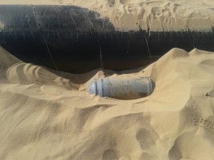 Explosive device hidden beside the Sarir pipeline (Photo: PFG)