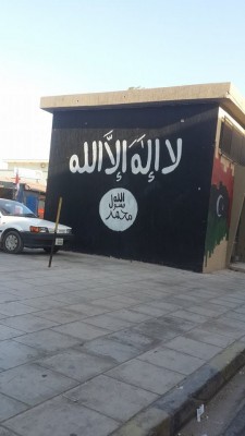 The black flag pic "Qaeda-linked flag painted on sub-power station in Benghazi's Ras Abaida"