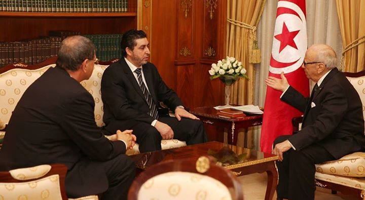 Khalifa Ghwell (centre) in Tunis with Tunisian President CAid Essebsi (right) and Priem Minister