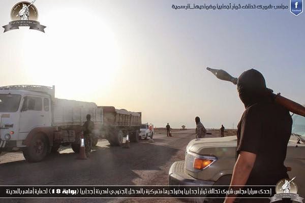 Ansar Sharia posts photos of its Shura Council alliance at southern entrance of Ajdabiya,