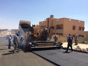 Teams lay asphalt on new road in Ghariyan (Photo: Libya Herald staff)