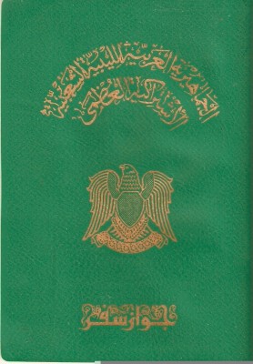 The details of the old Qaddafi-era Libyan passports were written by hand.