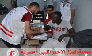 Detainees receive medical exams prior to being deported. (PHOTO: Libyan Red Crescent)