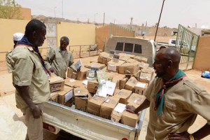 Ghat's Scouts and Guides organisation oversees delivery of school supplies from UNICEF