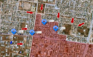 The Leithi battlefield today. Red areas are still controlled by militants. Nubs Square is in the top  of the picture (Image: Libya Herald staff)