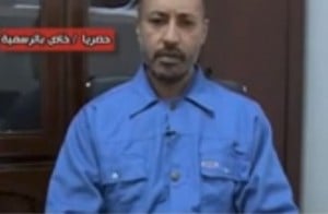 Saadi Qaddafi during his interrogation last year (Screen grab)