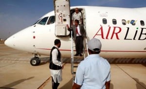 Tarhouni leads CDA members onto the tarmac at Ghadames (photo: LibyasChannel) 