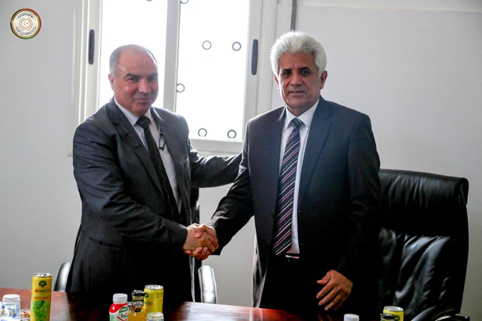 OUtgoing Interior Minitser Mustafa Dabbashi hands over to new Interior Minister Madani