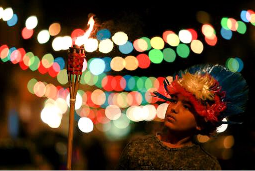 A Benghazi boy bears a torch for the procession in honour of the Prophet's Birthday (Photo: Social media)