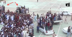 Crowd gathers yesterday to watch the Sirte murders