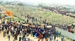 Mourners crowd scores of coffins today in Zliten's cemetery (Photo: Zliten (Council)