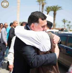 Faiez Serraj gets a hug today in Martyrs' Square (Photo: Presidency Council)
