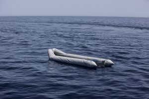 An empty rubber dinghy left floating after the 104 migrants and refugees had been rescued by the private NGO, Migrant Offshore Aid Station ship The Phoenix about 30 miles from the Libyan shore from where they had set out from 12 hours before. All the people were rescued and taken to Sicily